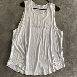 Club Pilates, “Radiate Kindness” in black, muscle tank